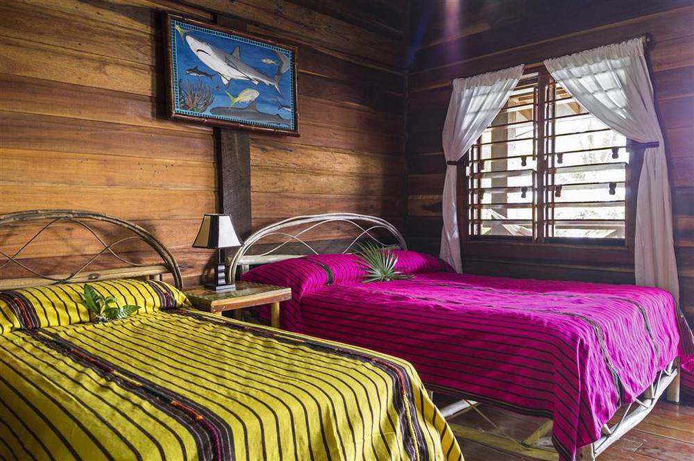 Itza Resort Long Caye Quarto foto